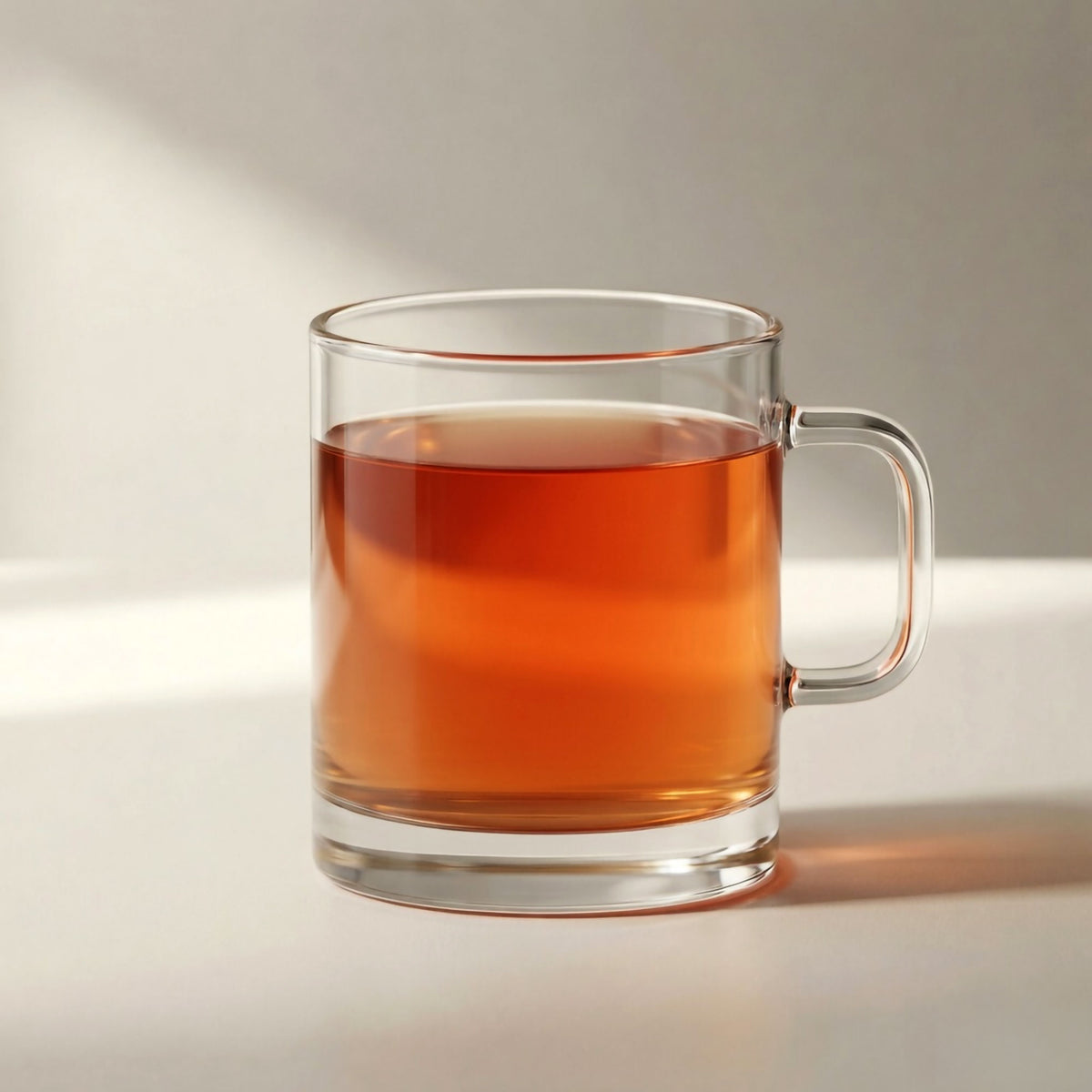 Brewed Dandelion and Burdock herbal tea in a clear glass cup